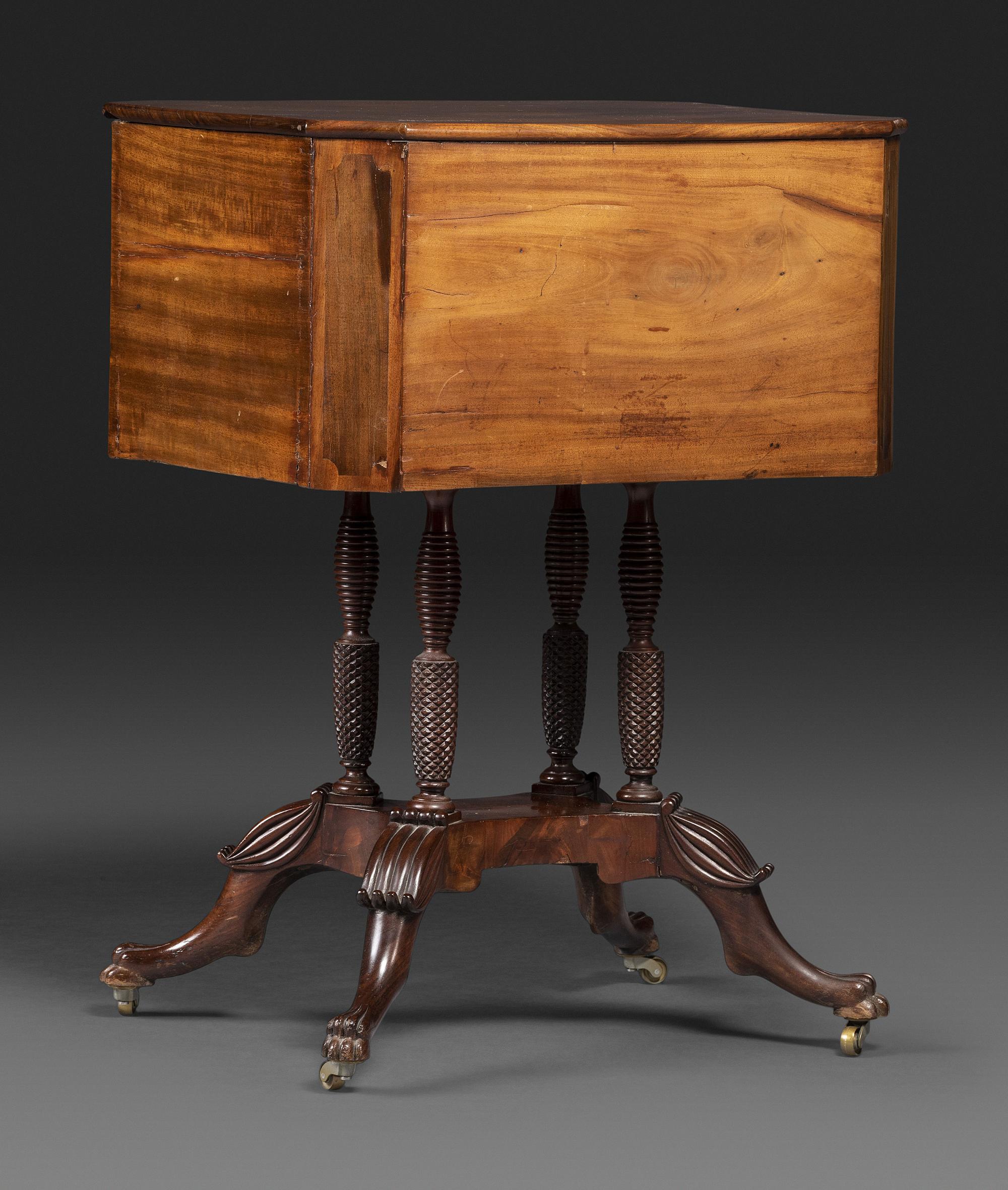 A Classical Figured Mahogany Two Drawer Claw-Foot Work Table