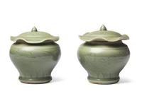 A Pair of Small Chinese Celadon Covered “Lotus” Jars
