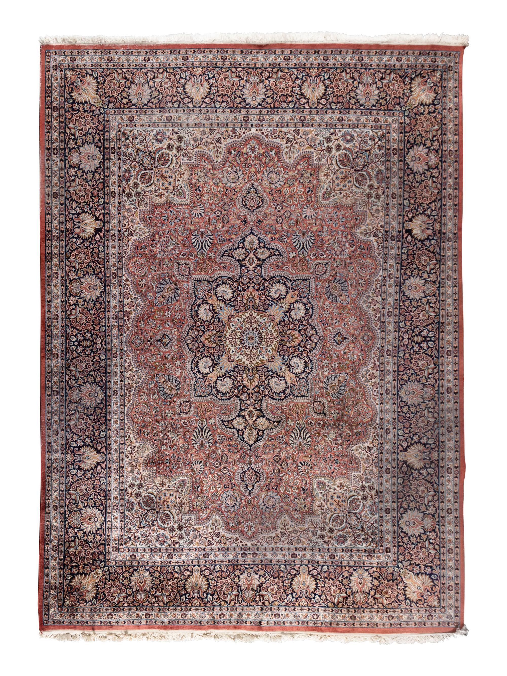 A Qom Wool and Silk Rug
