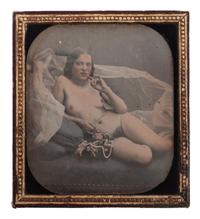 [EARLY PHOTOGRAPHY]. Sixth plate hand-colored daguerreotype of a reclining female nude.