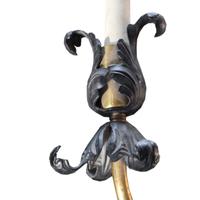 A Brass and Iron Seven Arm Wall Sconce, United States, Circa 1930,