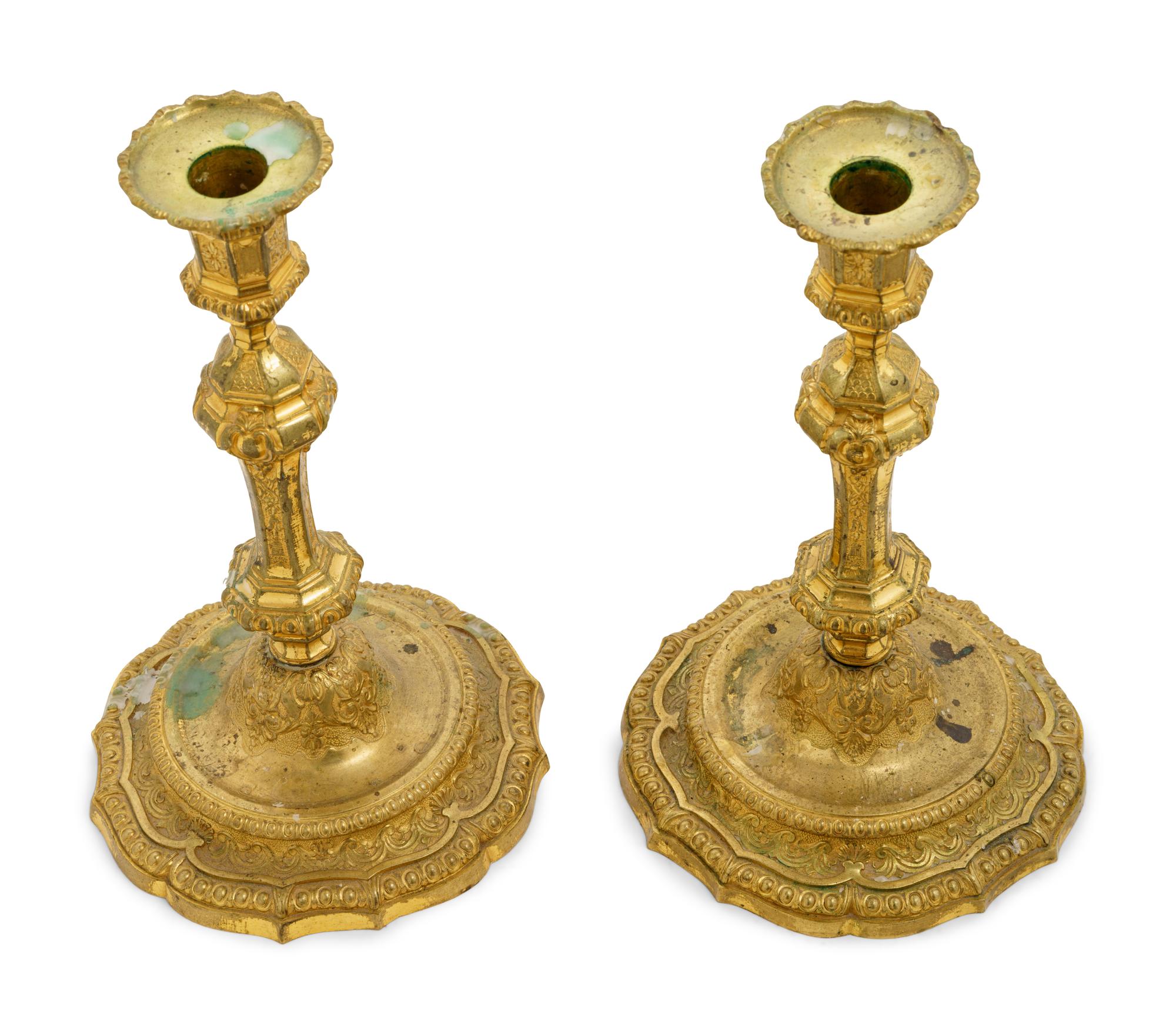 A Pair of Gilt Bronze Candlesticks