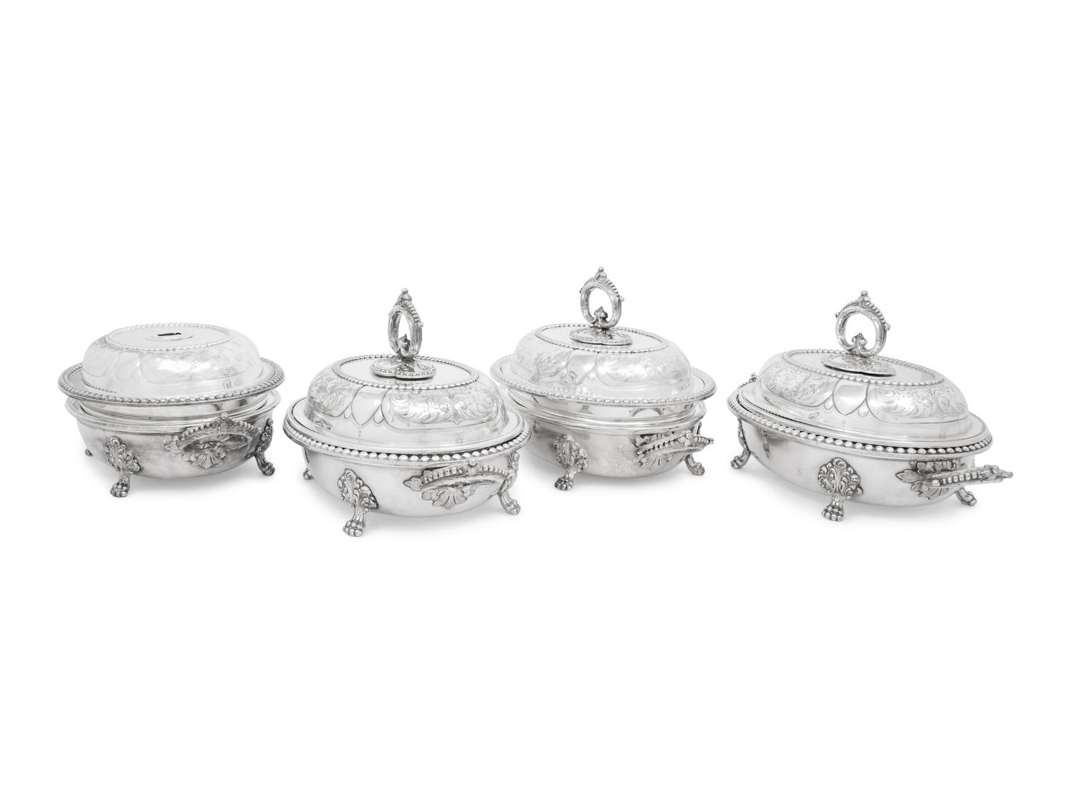 A Set of Four Victorian Silver-Plate Oval Vegetable Dishes with Covers and Liners