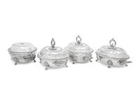 A Set of Four Victorian Silver-Plate Oval Vegetable Dishes with Covers and Liners