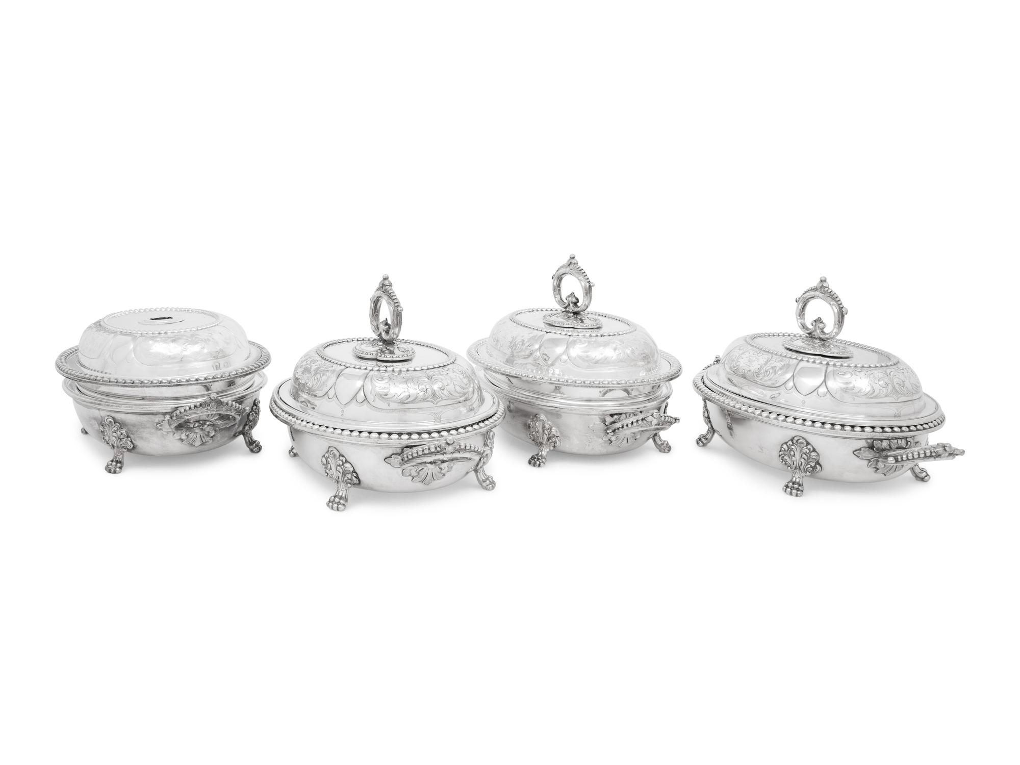 A Set of Four Victorian Silver-Plate Oval Vegetable Dishes with Covers and Liners