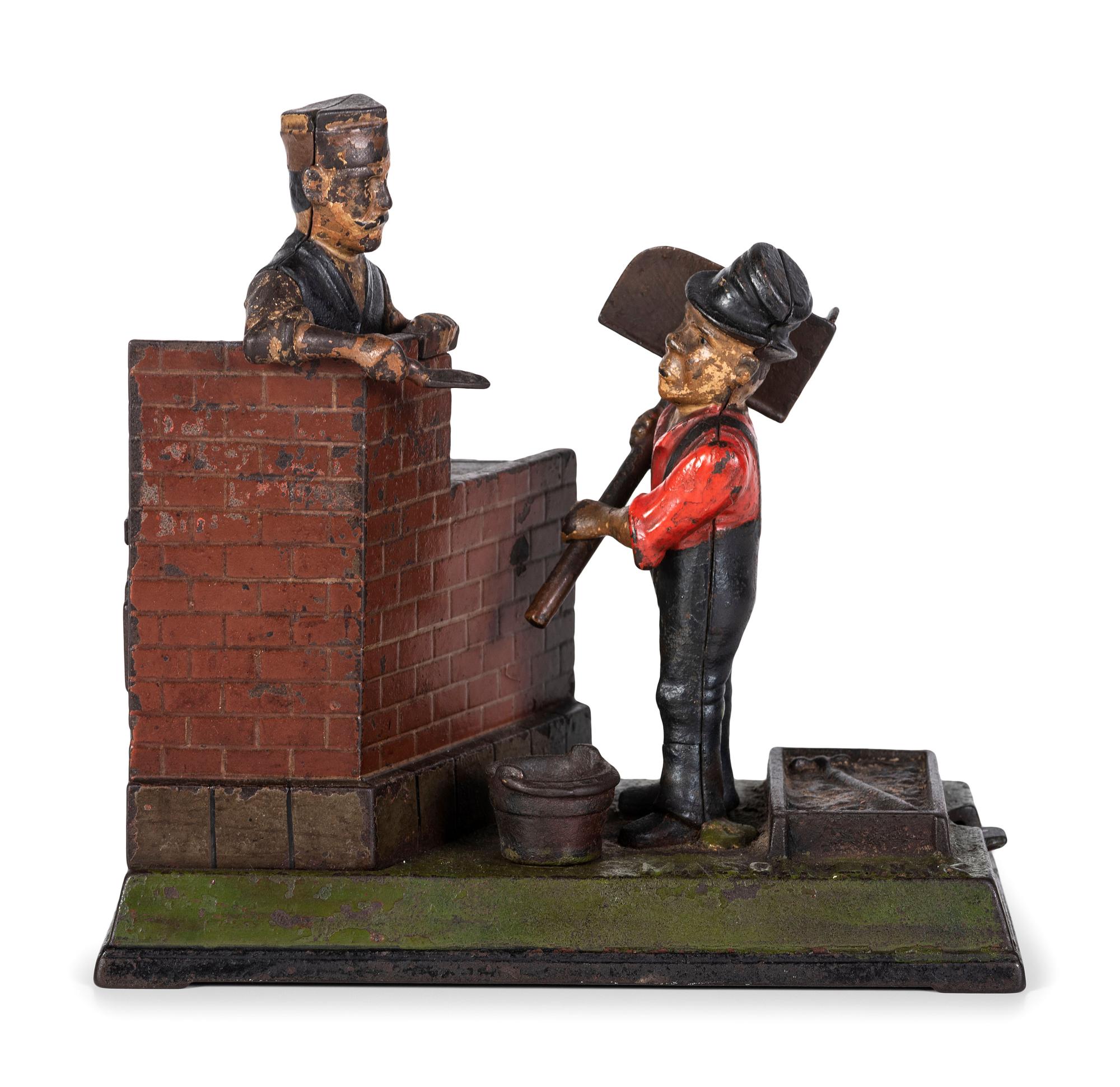 A Shephard Hardware Excelsior Series 'Mason' Cast Iron Mechanical Bank