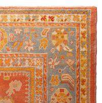 An Oushak Wool Rug