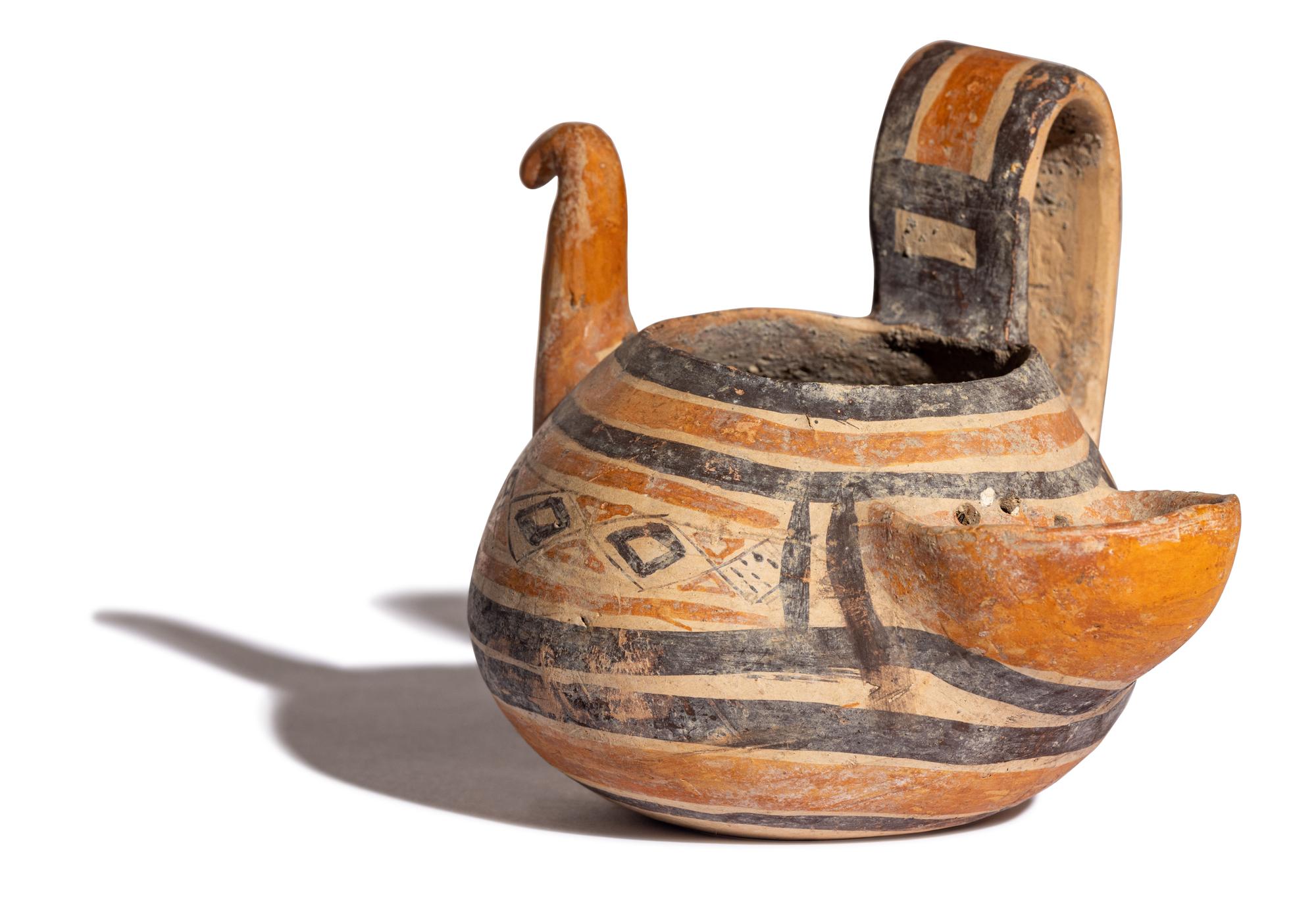 A Daunian Painted Pottery Figural Vessel in the Form of a Bird