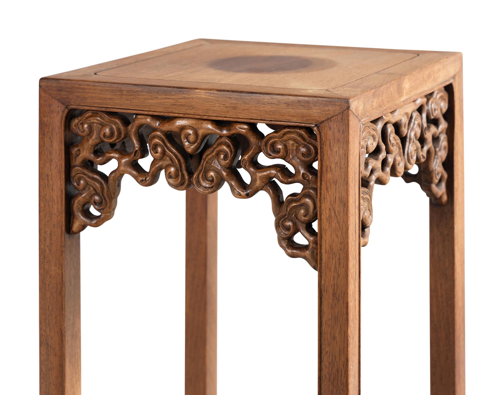 A Pair of Chinese Hardwood Jardiniere Stands