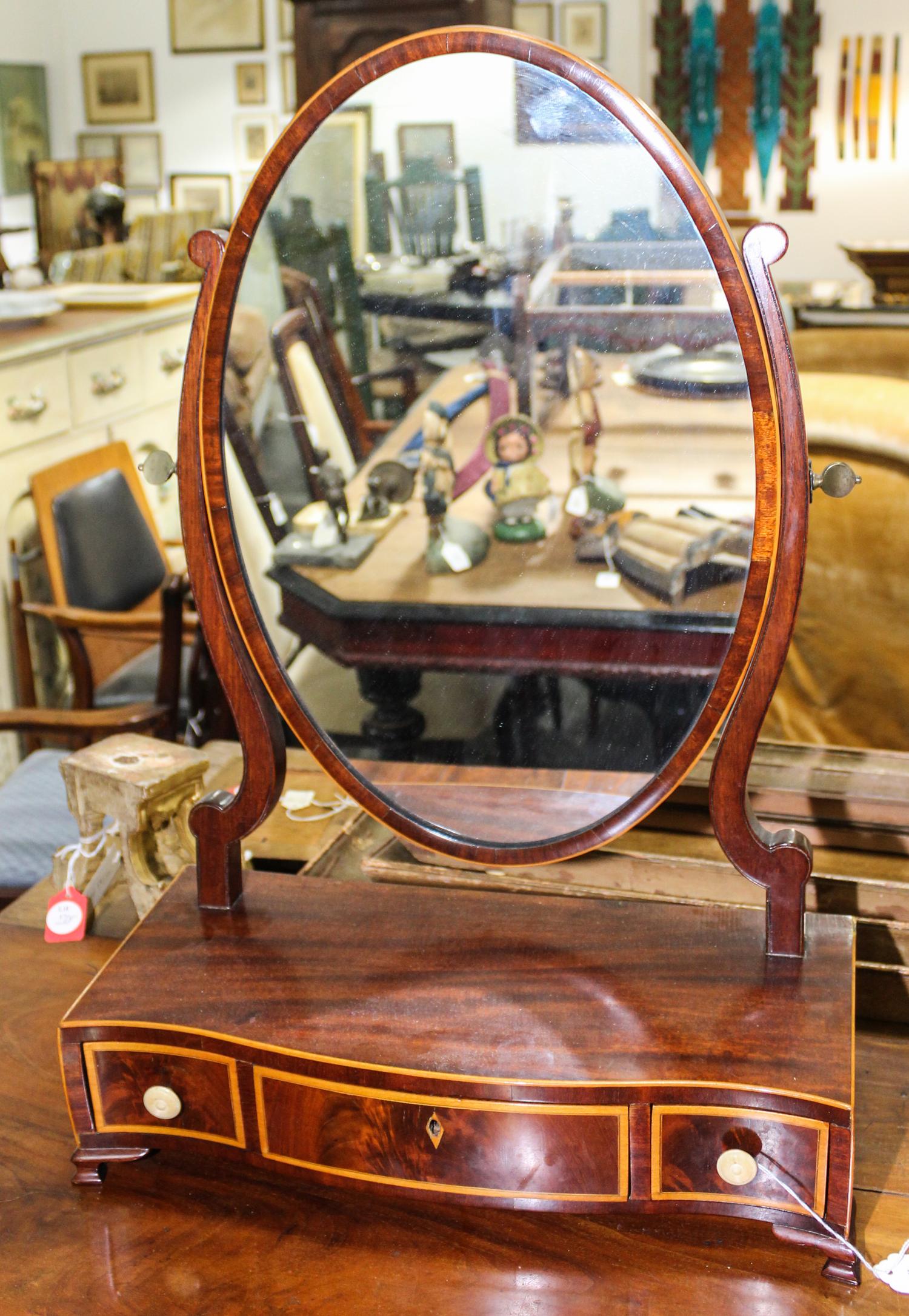 An English Hepplewhite Shaving Mirror Height 24 x width 16 1/2 inches. — CIRCA 1800