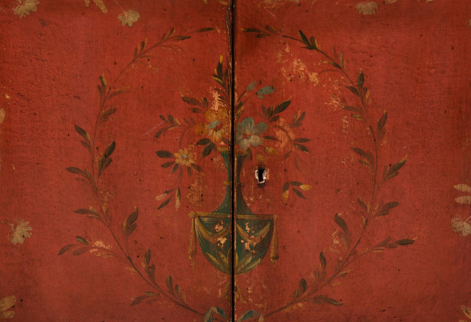 A Pair of Venetian Style Red Painted Cabinets