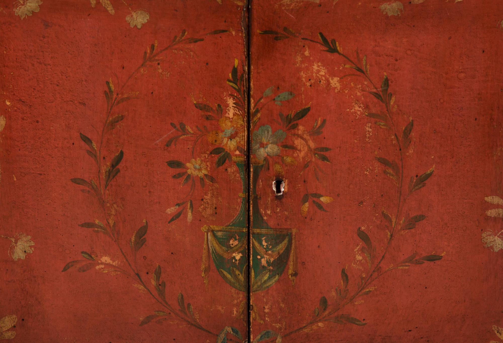 A Pair of Venetian Style Red Painted Cabinets