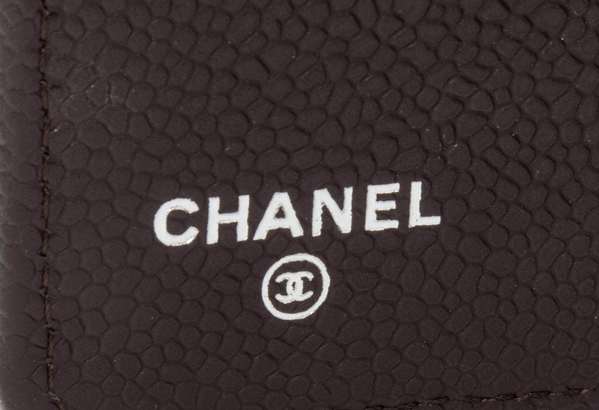 A Chanel Brown Caviar Quilted Leather Portfolio, 6.5" x 8.75" x .75".