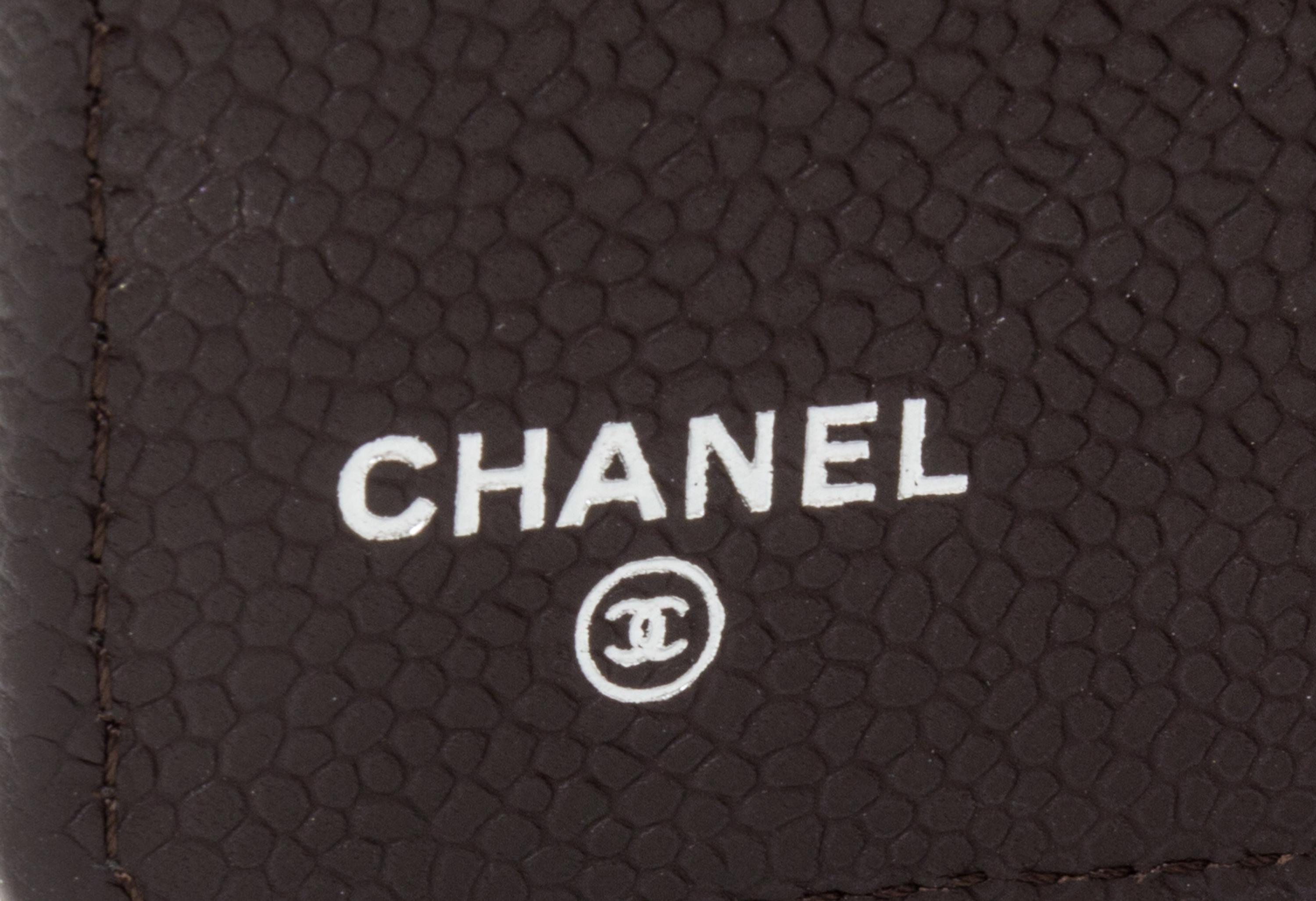 A Chanel Brown Caviar Quilted Leather Portfolio, 6.5" x 8.75" x .75".