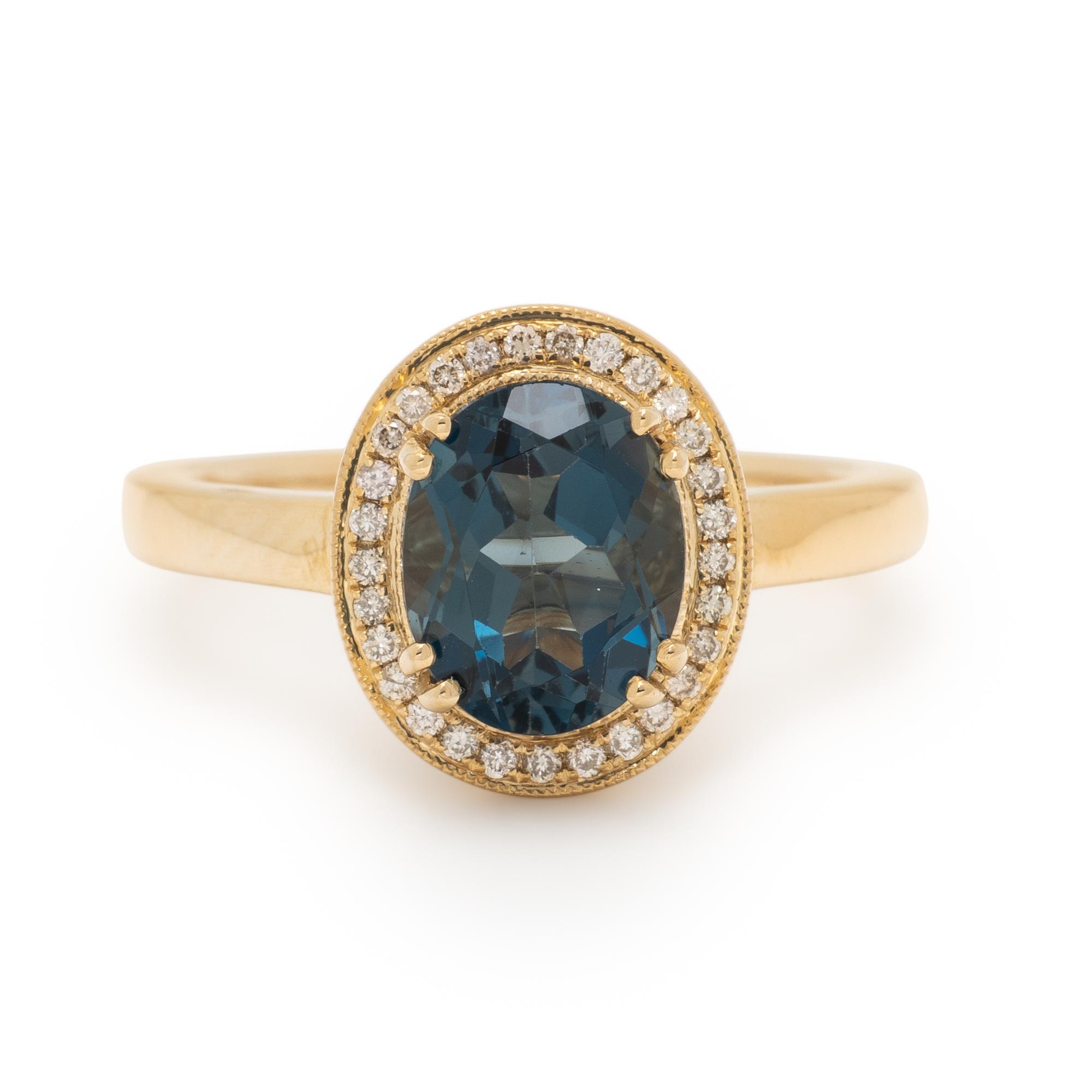 BLUE TOPAZ AND DIAMOND RING