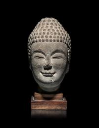 A Chinese Carved Stone Head of Buddha