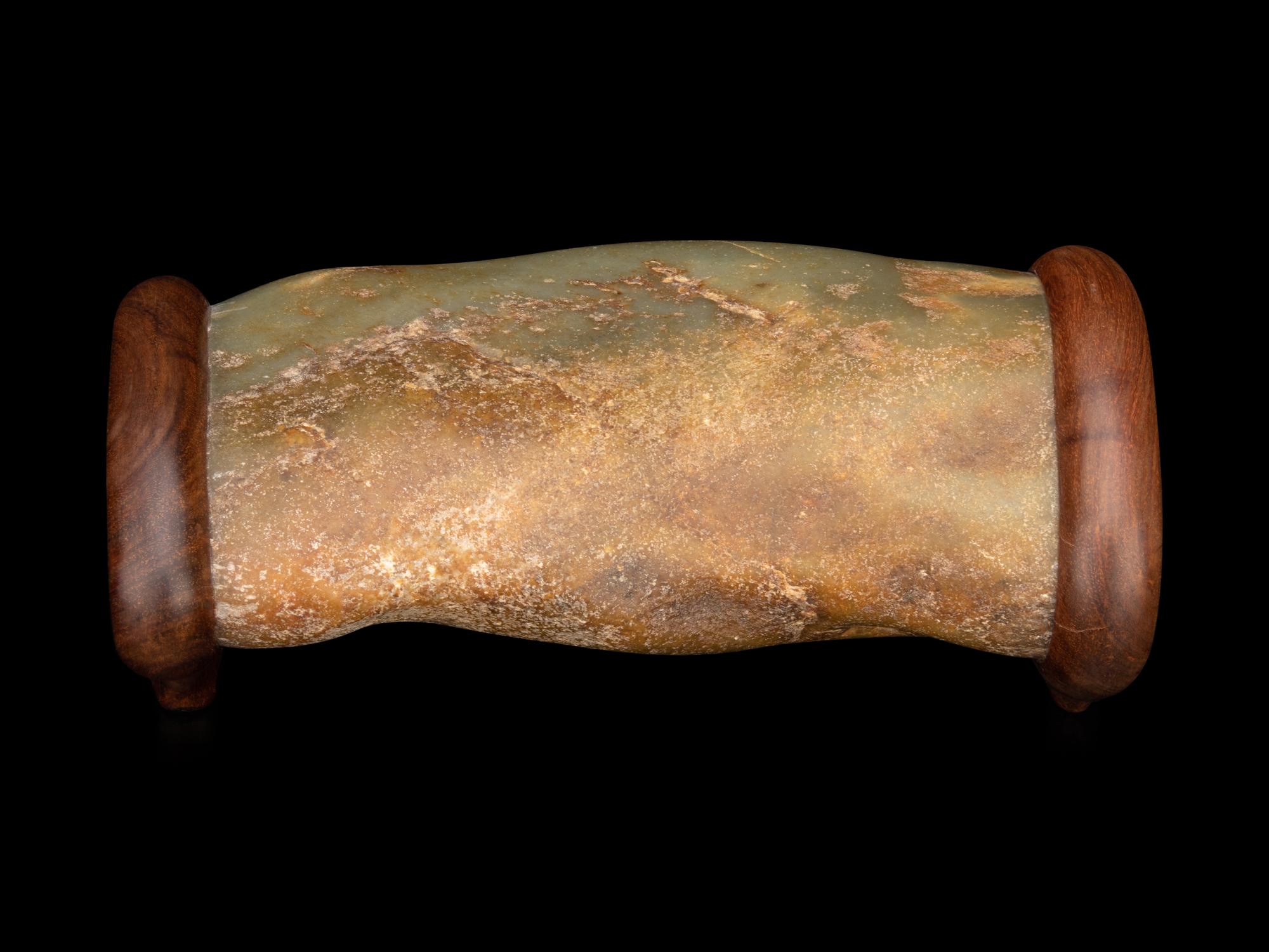 A Chinese Celadon Jade Pillow