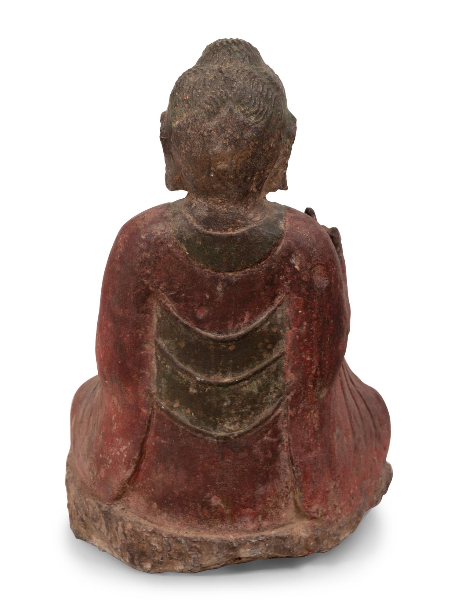 A Chinese Carved Stone Seated Buddha with Polychrome Decoration