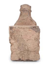 An Asian Carved Stone Seated Figure