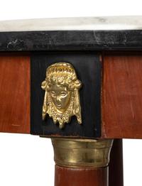 An Empire Style Brass Mounted Mahogany Center Table with a Specimen Marble Top