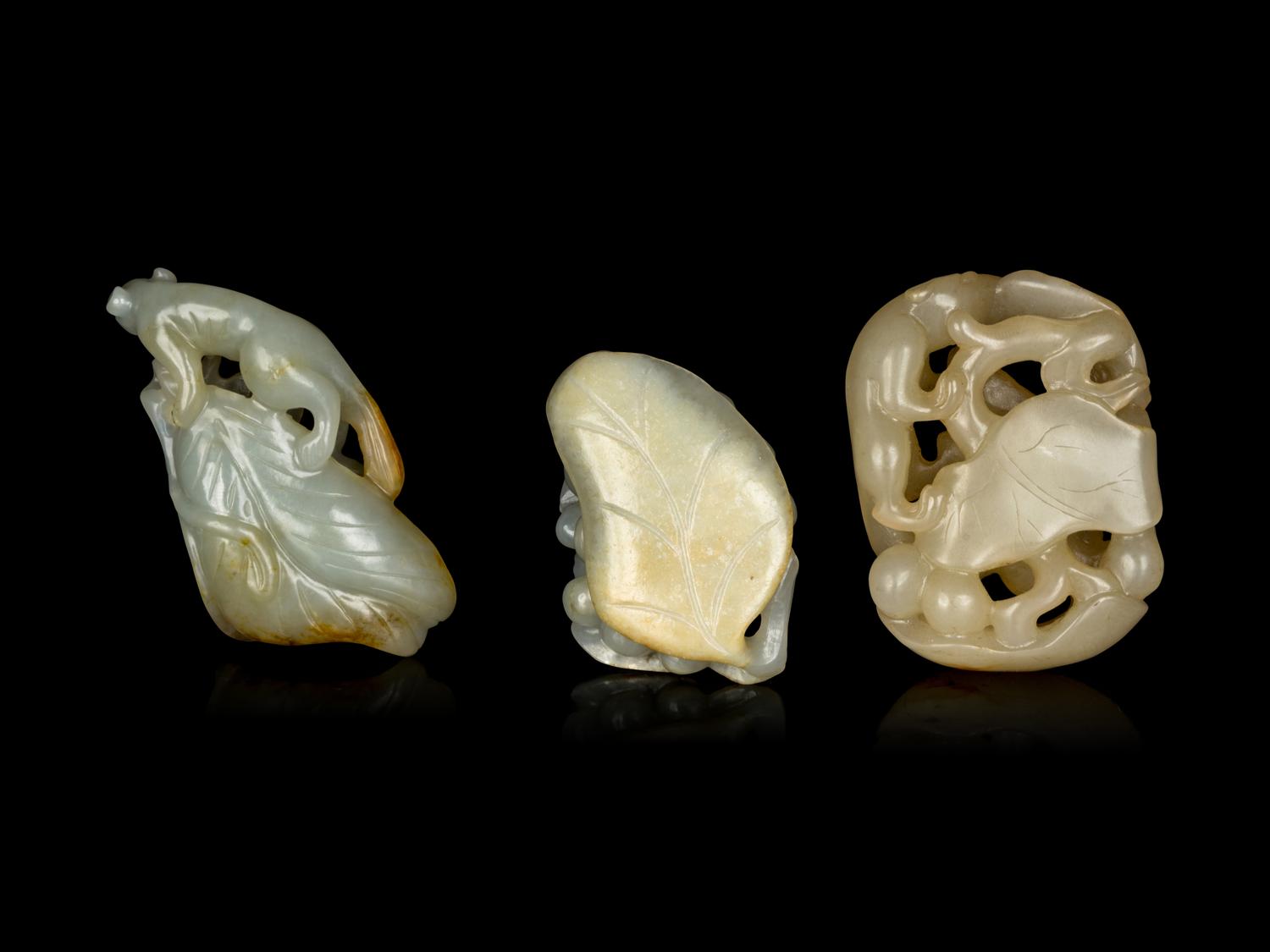 Three Chinese Jade Carvings of 'Squirrel and Grapes'