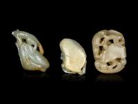 Three Chinese Jade Carvings of 'Squirrel and Grapes'