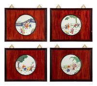 A Set of Four Chinese Famille Rose Porcelain Inset Hardwood Wall Panels
