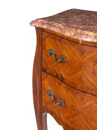 A Pair of Louis XV Style Tulipwood Marble-Top Commodes
