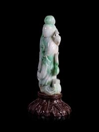 An Apple Green and White Jadeite Figure of a Lady Immortal