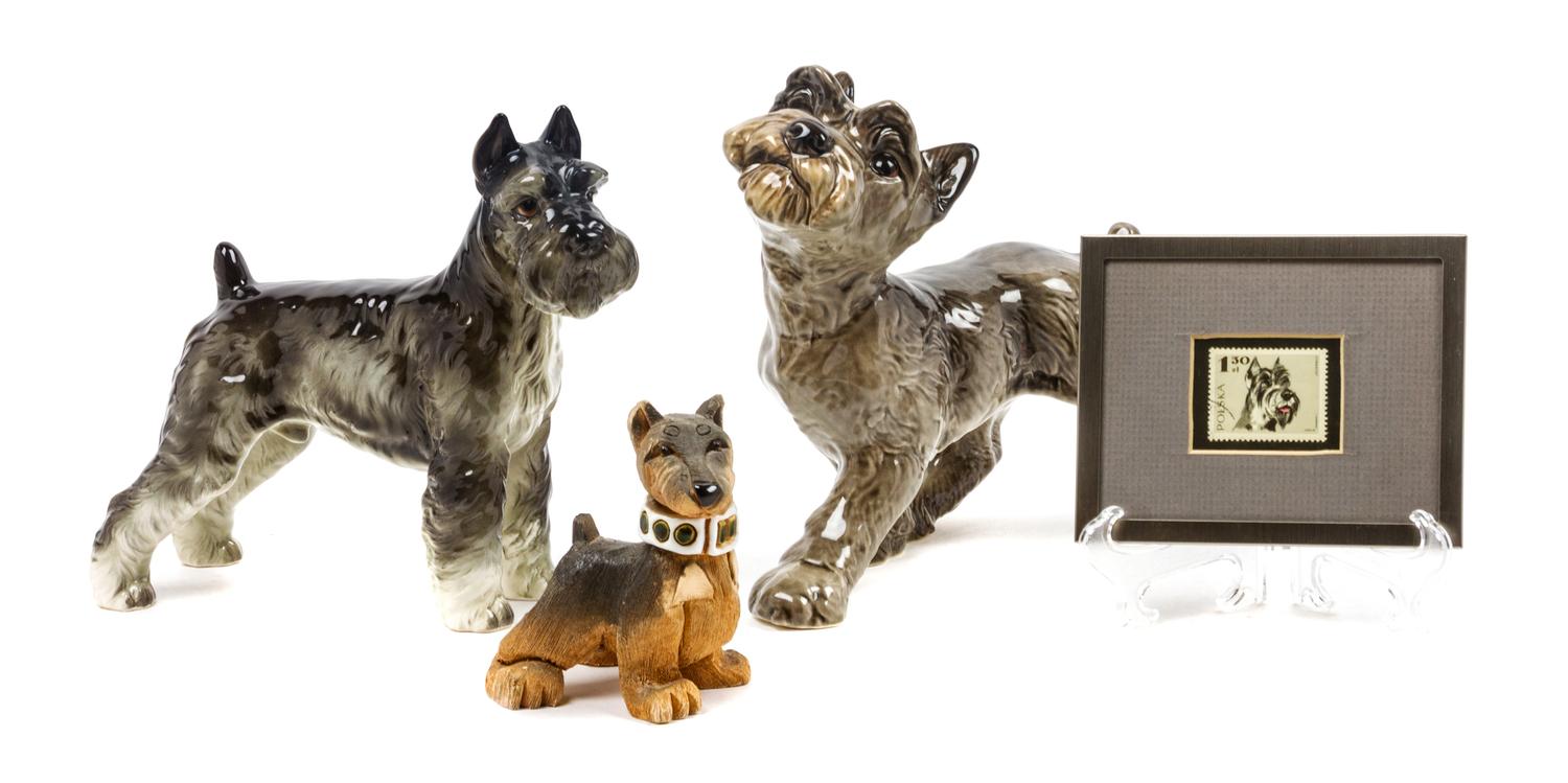 A Group of Four Schnauzer Figures Width of widest 8 3/4 inches.