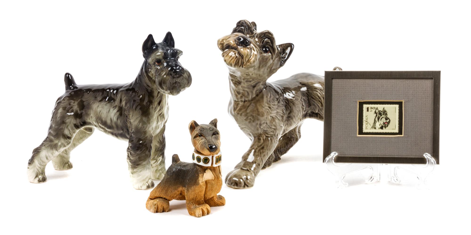 A Group of Four Schnauzer Figures Width of widest 8 3/4 inches.