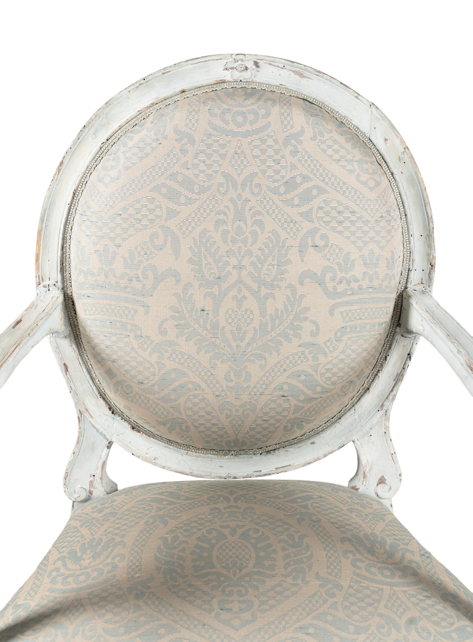 A Pair of Louis Philippe White Painted Fauteuils