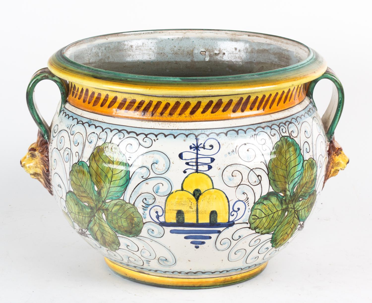 A Glazed Ceramic Jardiniere with Lion Mask Handles