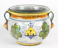 A Glazed Ceramic Jardiniere with Lion Mask Handles