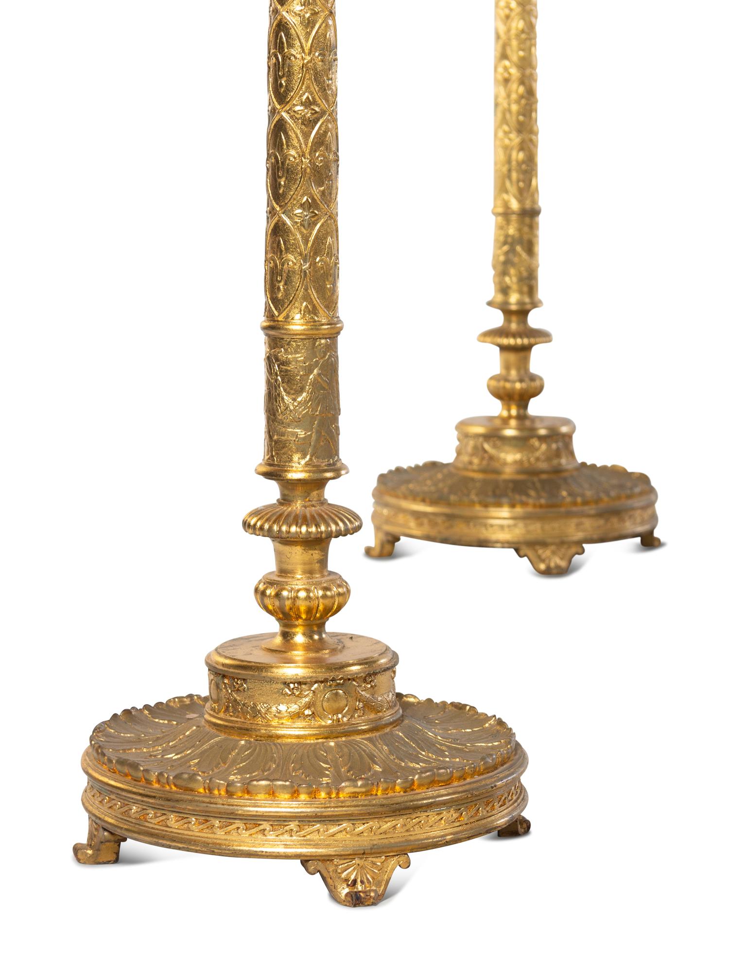 A Pair of Gilt Metal Eight-Light Torchères