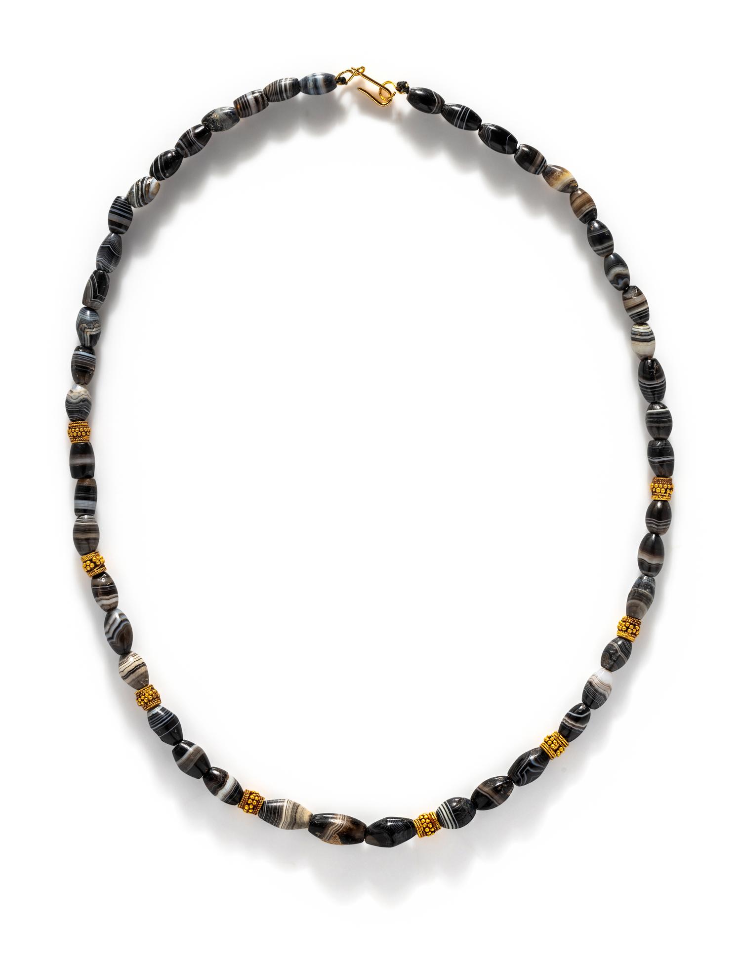 A Western Asiatic Gold and Banded Agate Bead Necklace