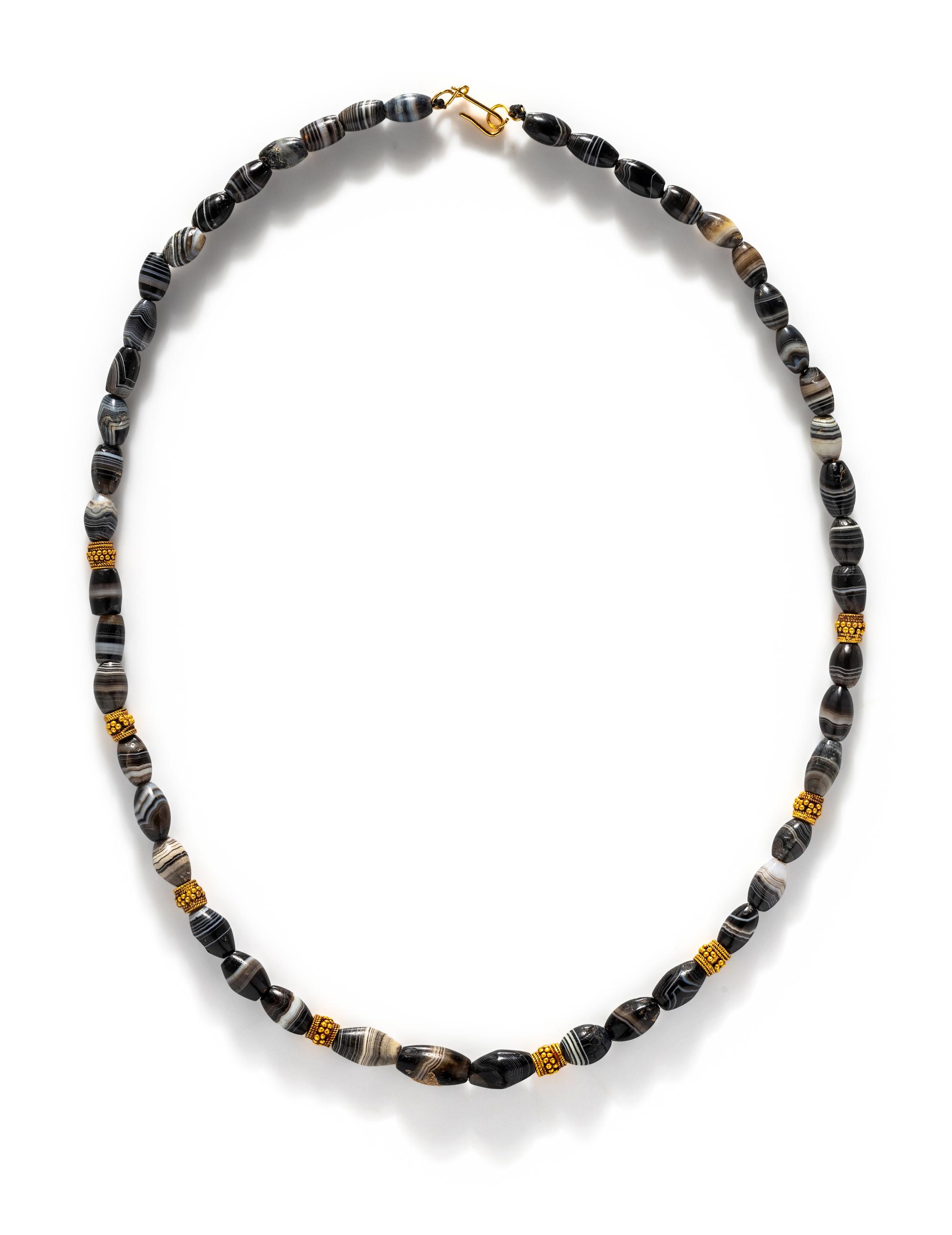 A Western Asiatic Gold and Banded Agate Bead Necklace