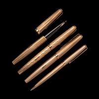 A Group of Four Parker 9-Karat Gold Writing Instruments
