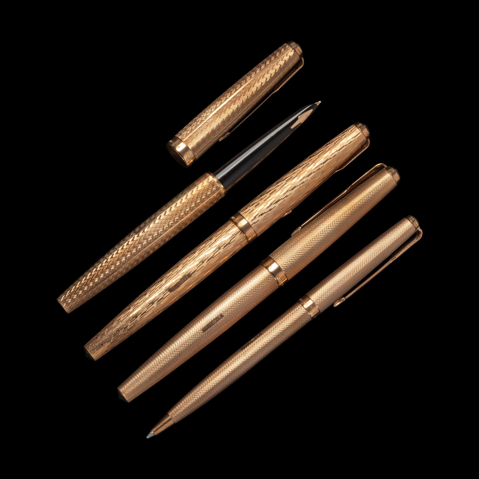 A Group of Four Parker 9-Karat Gold Writing Instruments