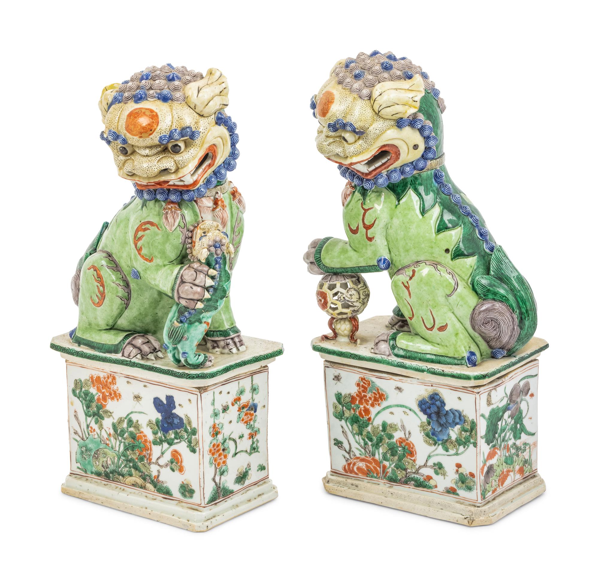 A Pair of Famille Verte Porcelain Figures of Fu Lions