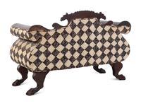 A Classical Carved and Figured Mahogany Settee