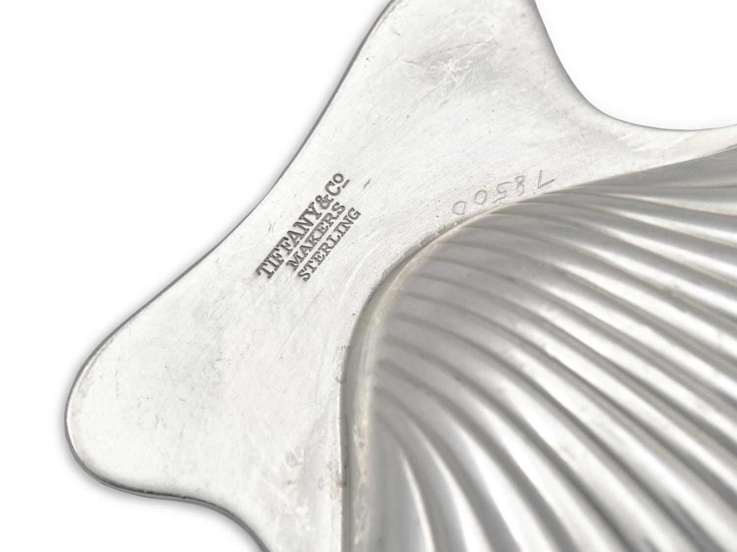 A Group of Tiffany and Co. Silver Shell-Form Salts and Placecard Holders