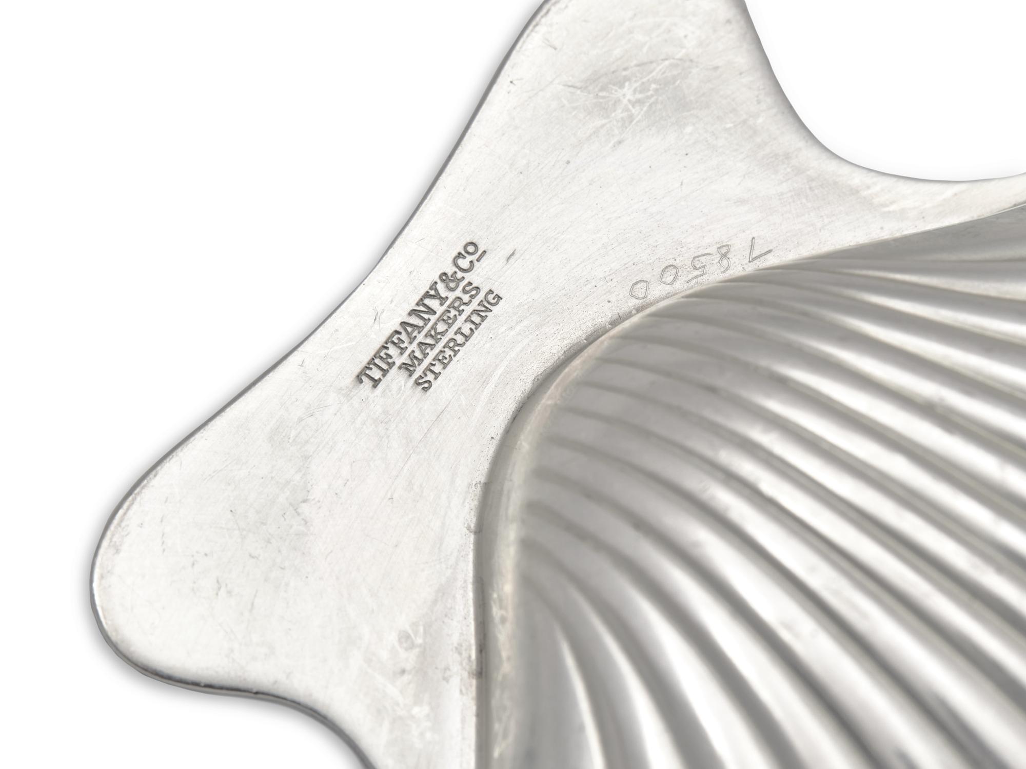 A Group of Tiffany and Co. Silver Shell-Form Salts and Placecard Holders