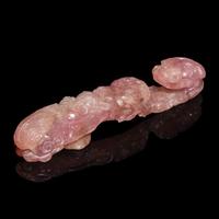 A Chinese Pink Tourmaline 'Dragon and Lingzhi' Belt Hook, 19th Century — 清晚期 碧璽螭龍帶鈎