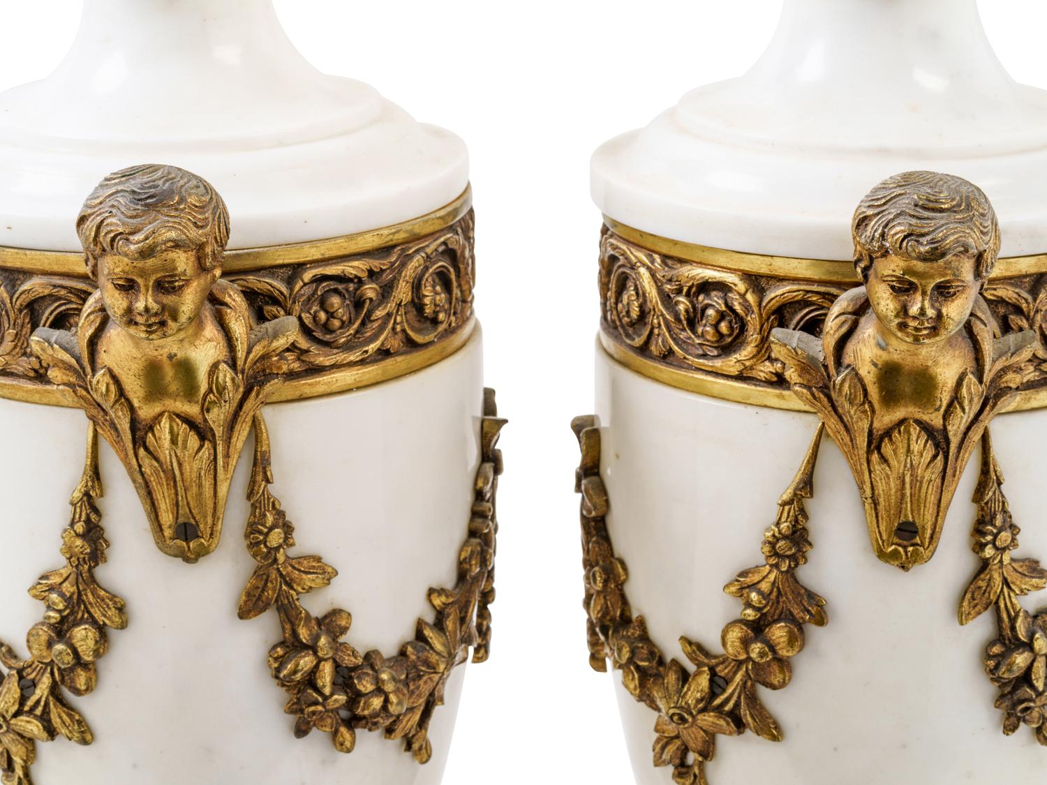 A Pair of Louis XVI Style Gilt Bronze and Marble Urns