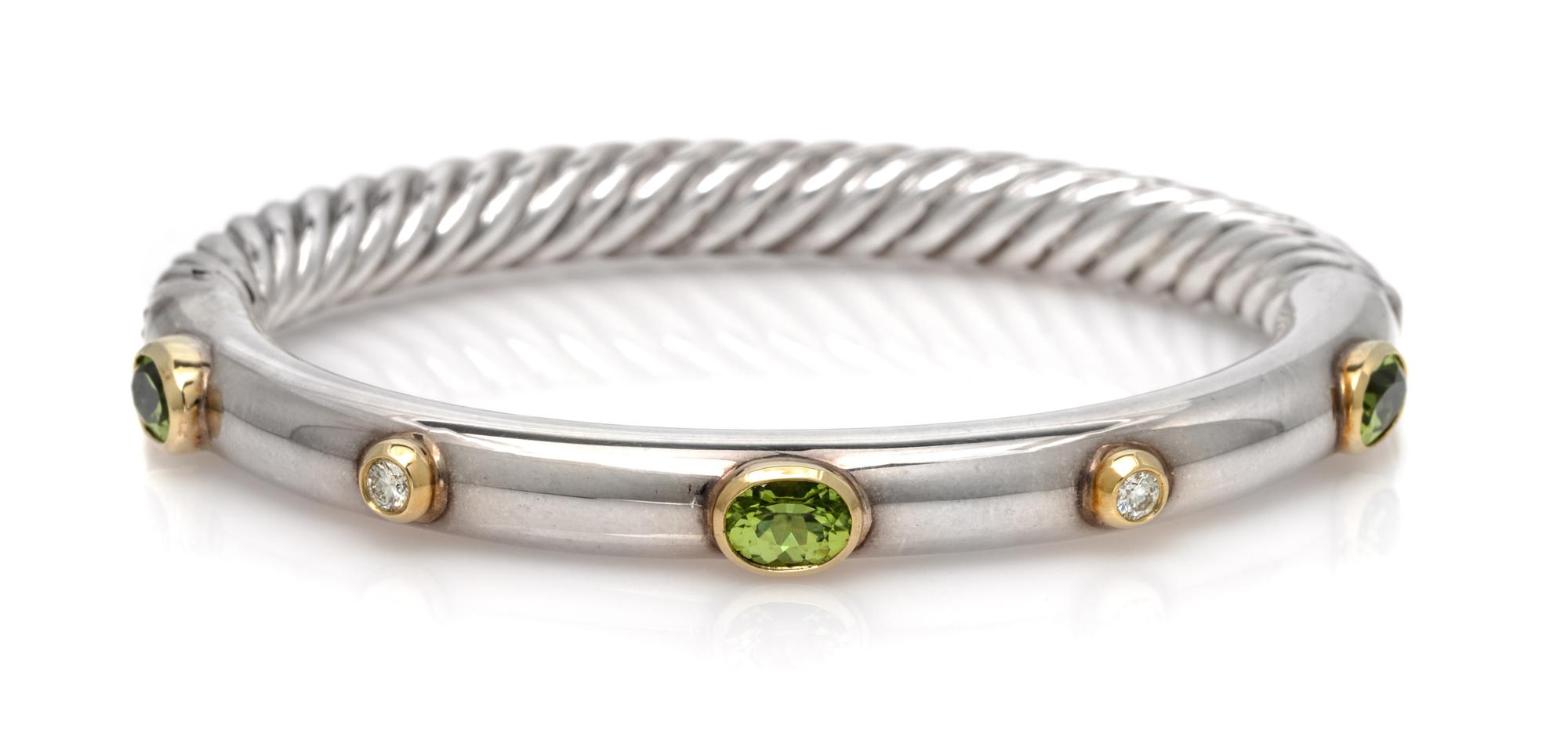 A Sterling Silver, 18 Karat Yellow Gold, Peridot and Diamond 'Cable' Bangle Bracelet, David Yurman, 15.00 dwts.