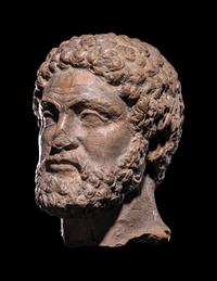 A Greek Terracotta Head of Hercules