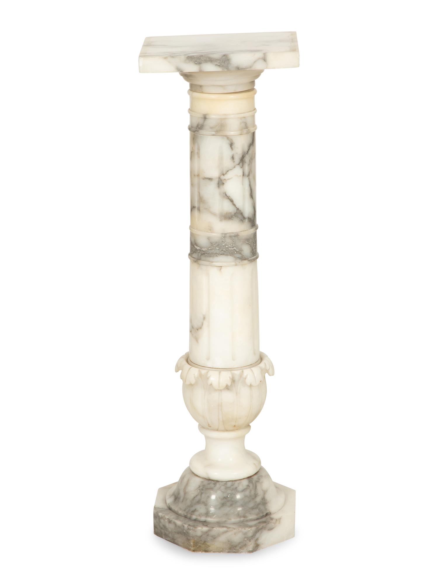 A Carved Alabaster Pedestal