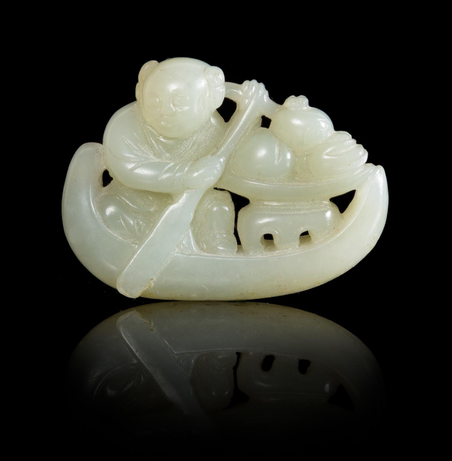 A Pale Celadon Jade Model of a Boy on a Boat Length 2 3/8 inches. — 18TH/19TH CENTURY