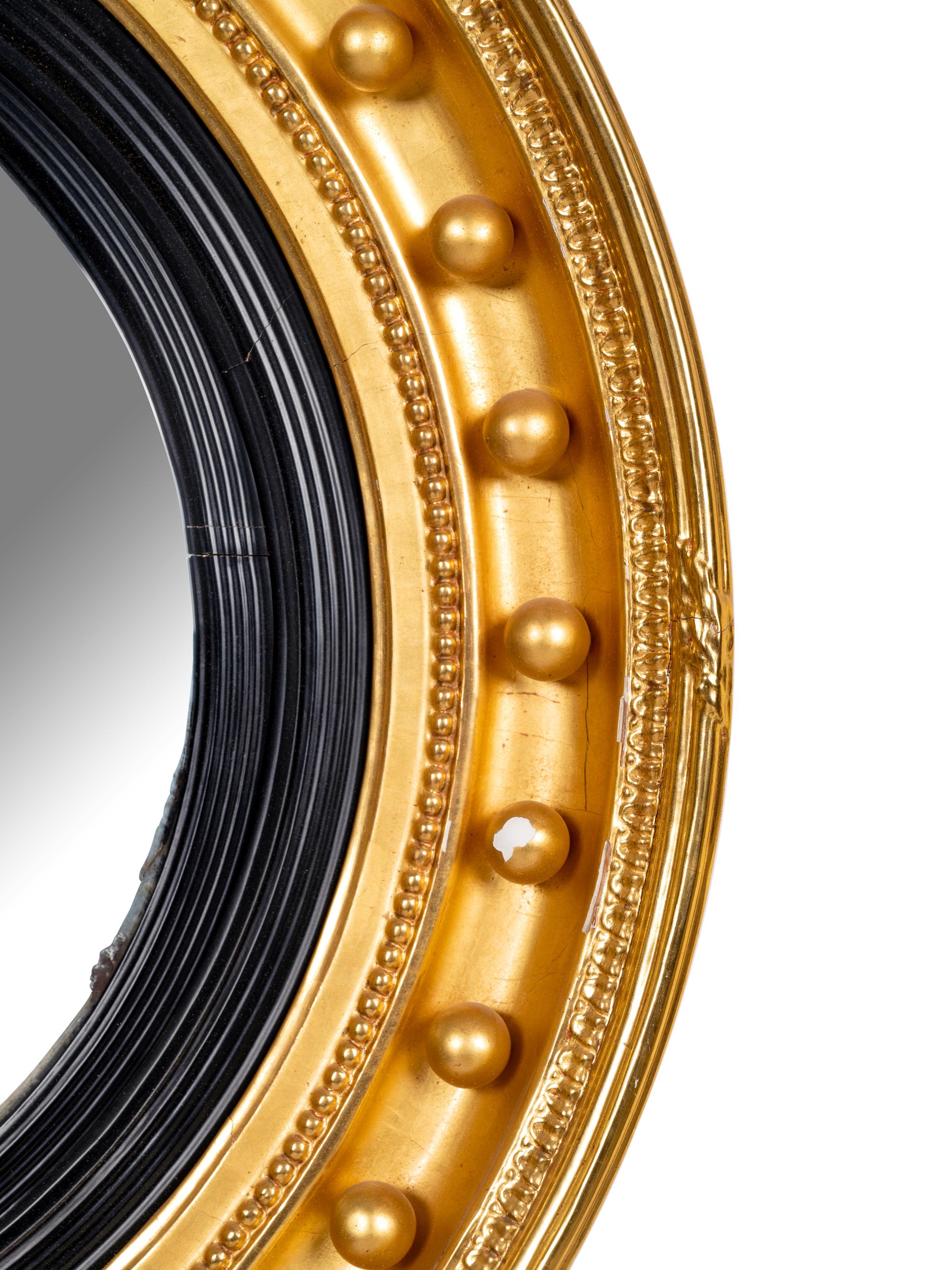 A Regency Style Giltwood Convex Mirror